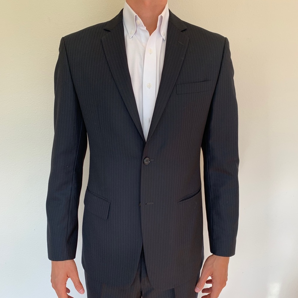 Navy pinstripe suit tailor made for tall, slender
